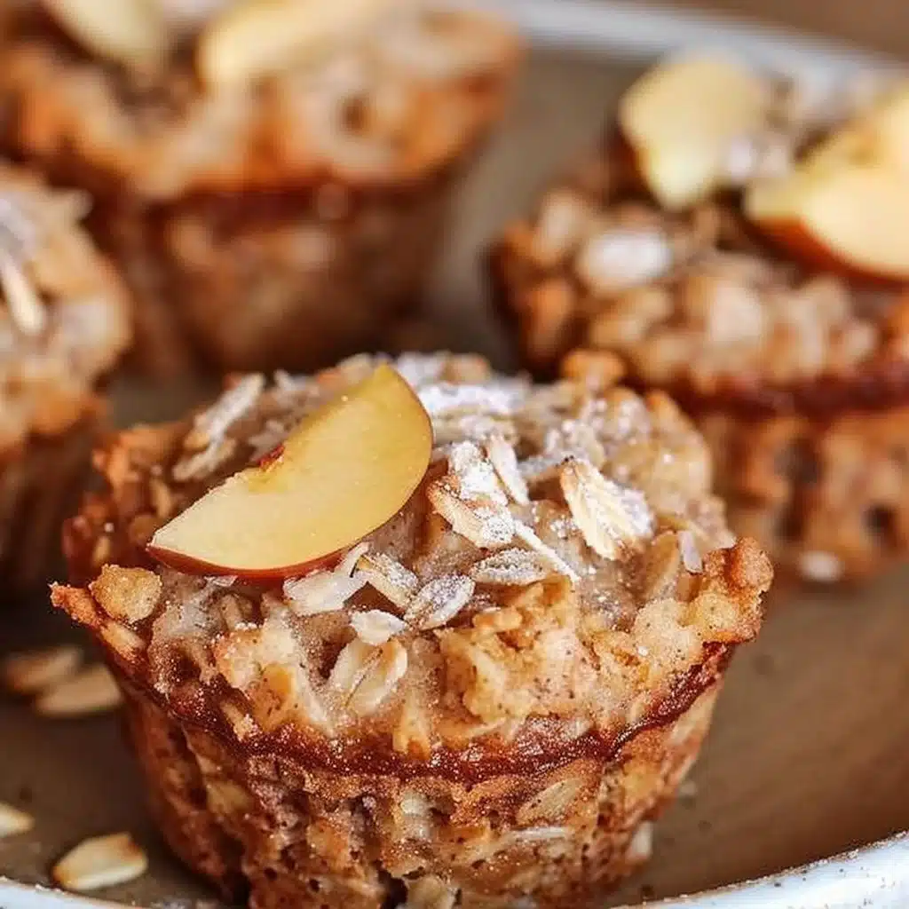 Fluffy baked apple cinnamon oatmeal cups served on a plate