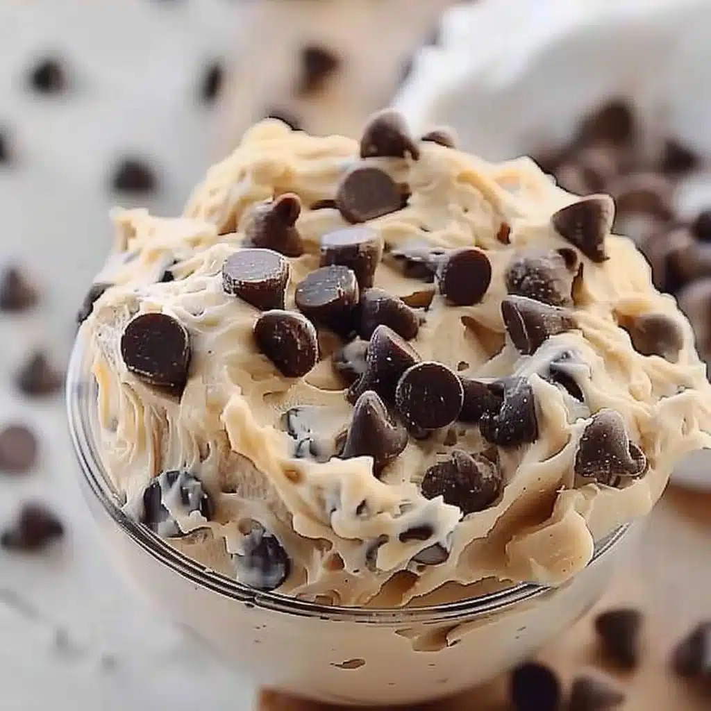 Bowl of Greek yogurt cookie dough with chocolate chips and a spoon